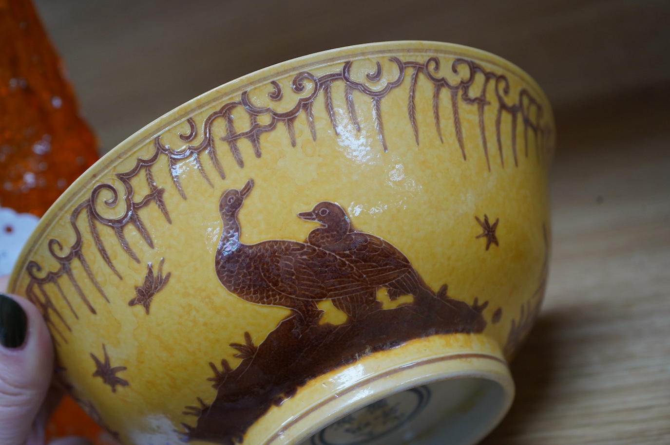 A Chinese celadon bowl and a fine yellow and brown decorated bowl, yellow bowl 9cm diameter. Condition - good